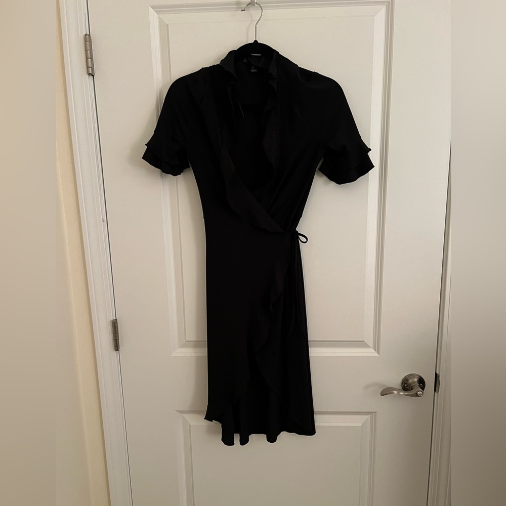 Black wrap dress.  Above the knee.  Aqua size XS